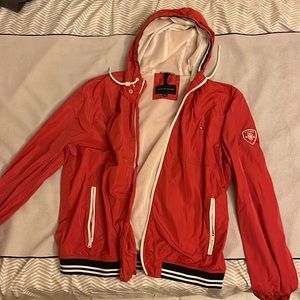 Tommy Hilfiger coral color size XL (fits similarly to an L) rain/windbreaker